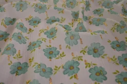 Chiffon – Green lurex leaves on baby pink