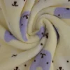 Coral Fleece – Animal faces light yellow