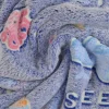 Coral fleece – Ocean adventure on navy