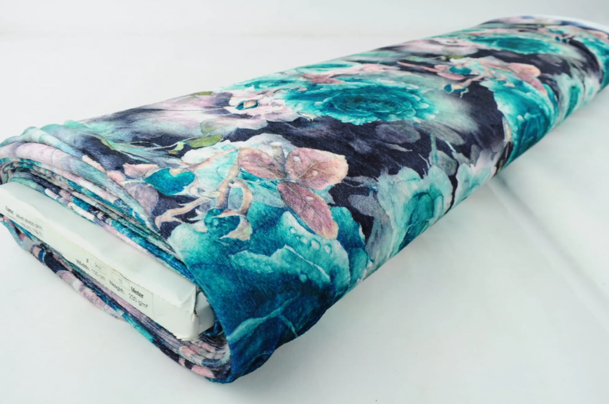 Fluweel stretch – Petrol colored flowers