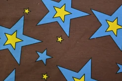 French terry – Cartoon stars on brown