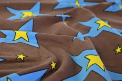French terry – Cartoon stars on brown