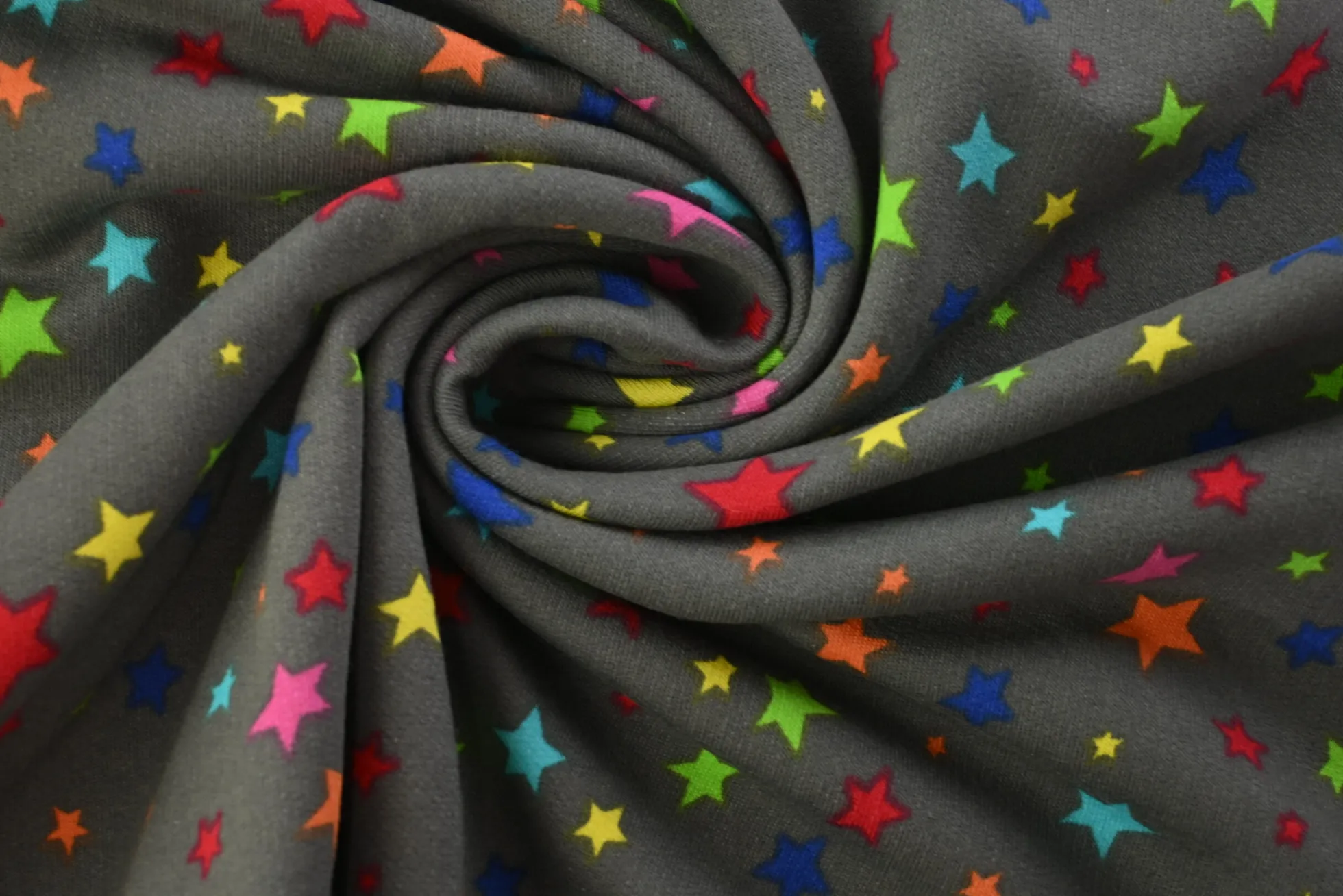 French terry – Colorful stars on dark grey