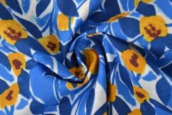 Katoen poplin – Bladeren fantasie blauw en okergeel