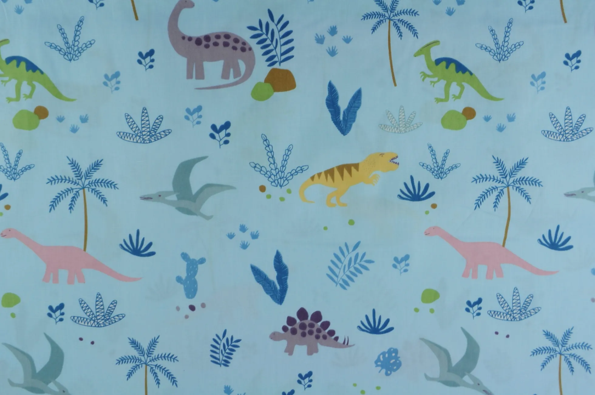 Katoen poplin – Blue dino adventure