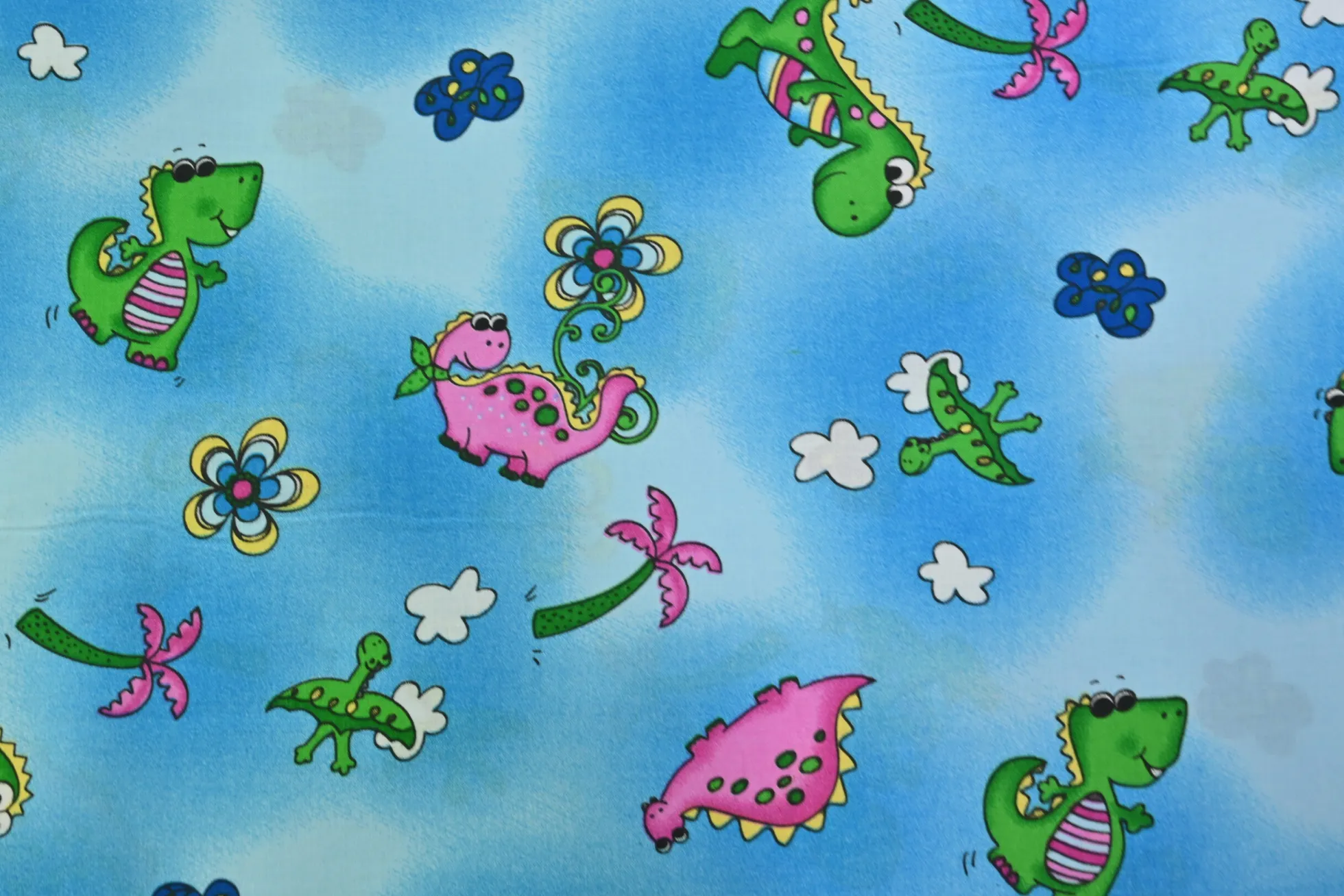 Katoen poplin – Happy dino on blue