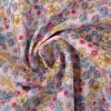 Katoen poplin – Kleine kleurrijke bloemenmix op oudroze