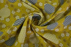 Katoen poplin – Oker bloemen en stippen
