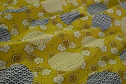 Katoen poplin – Oker bloemen en stippen