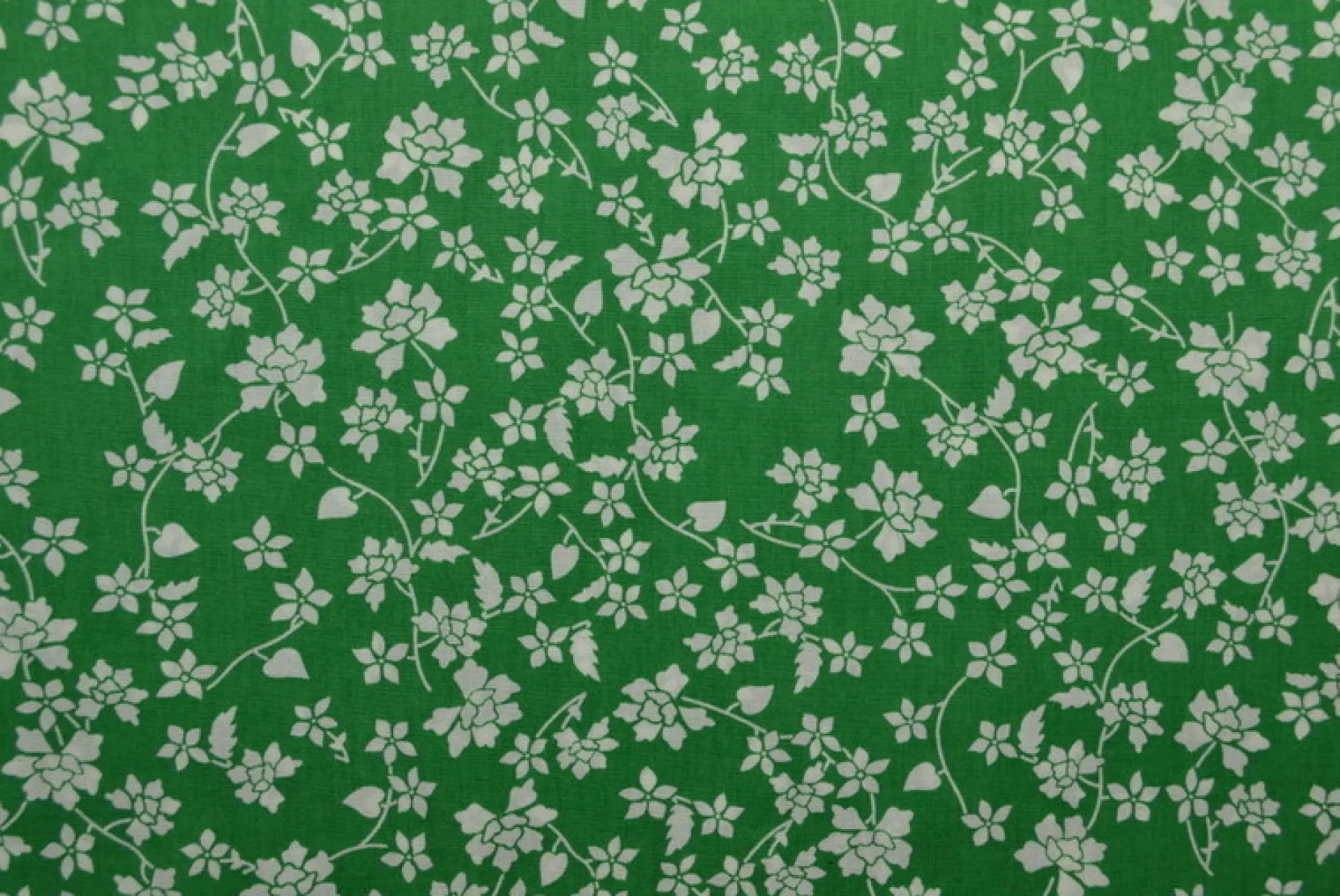 Katoen poplin – Puntige bloemen wit op groen