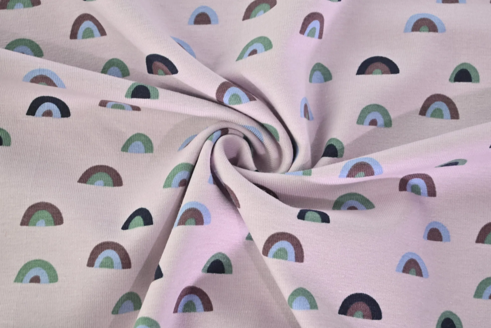 Katoen tricot – Rainbow on dusty pink