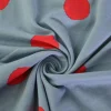 Katoen tricot – Red inkdots on jeansblue