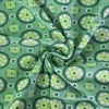 Katoen tricot – Retro green Blossom