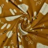 Katoen tricot Royal – Stoneage fantasy donker oker