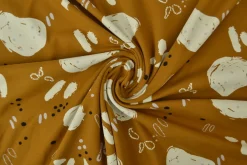 Katoen tricot Royal – Stoneage fantasy donker oker