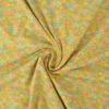 Katoen tricot – Wow – Kleine bloemetjes okergeel