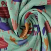 Sweaterstof / Jogging alpenfleece – Kleurrijke krabbetjes lichtgroen