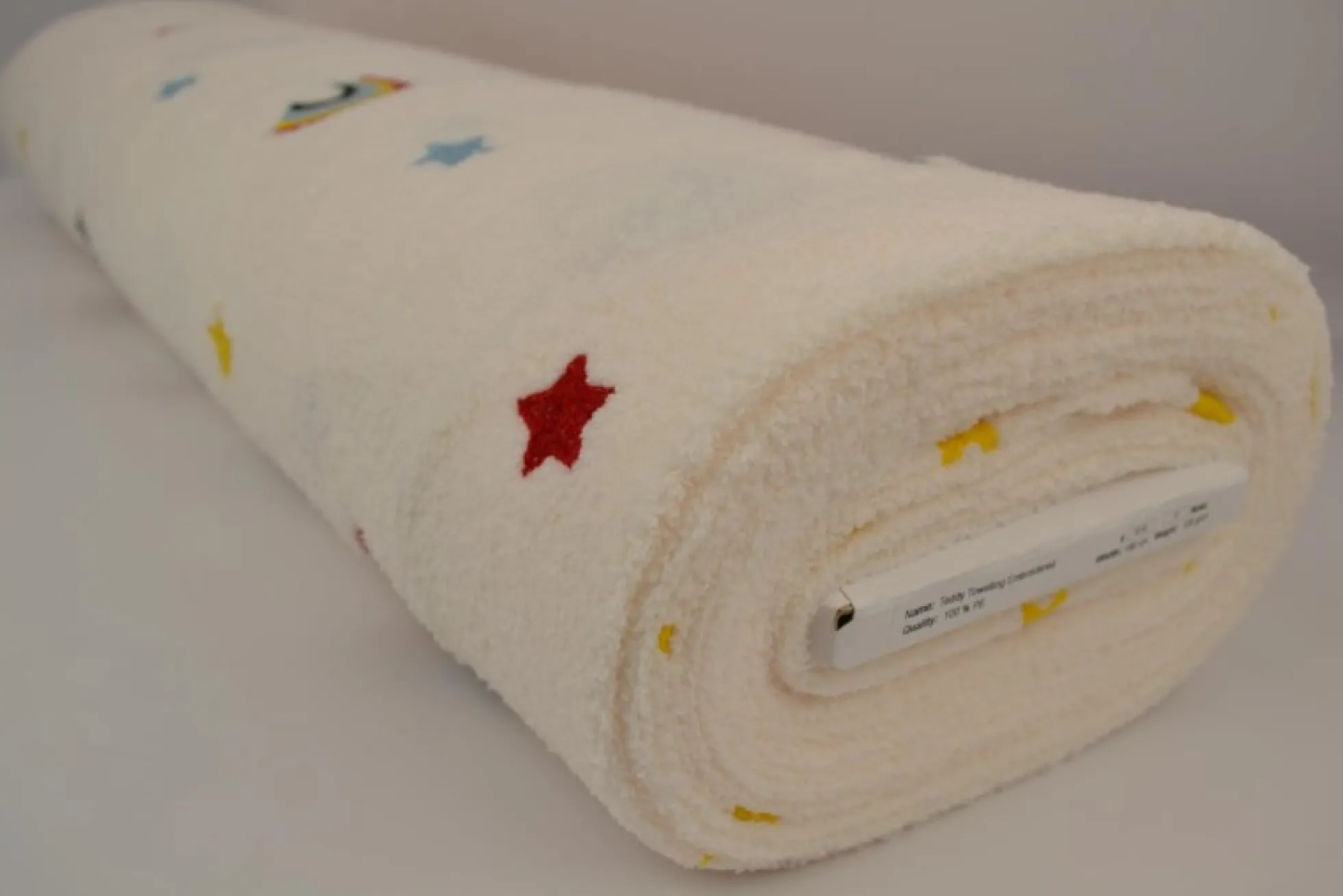 Teddy badstof – Regenbogen & sterretjes gebroken wit