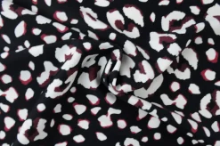 Travelstof – Brown & white animals dots on black