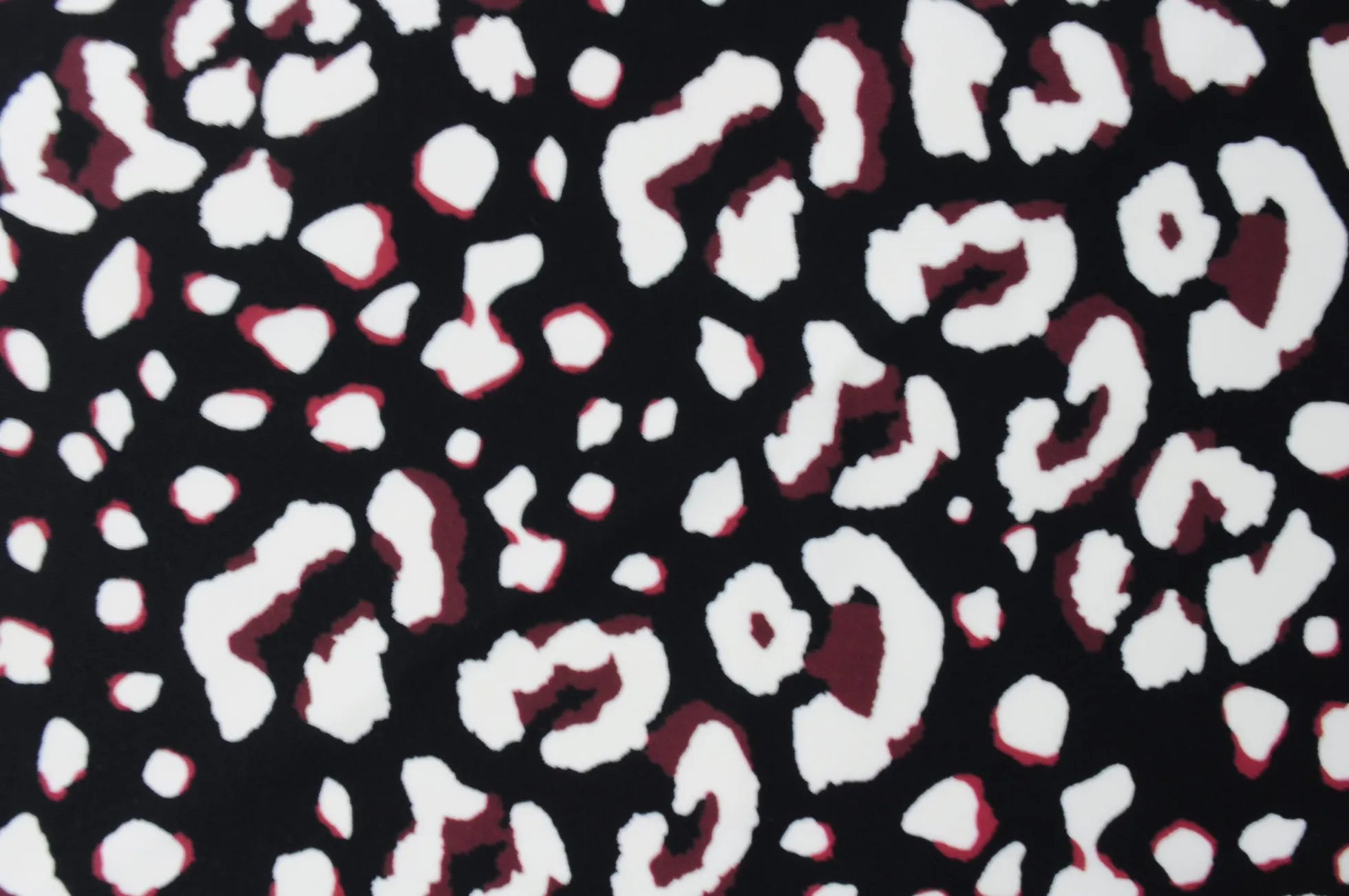 Travelstof – Brown & white animals dots on black