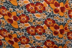 Viscose – Red and orange flowers on jaguar