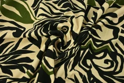 Viscose tricot – Jungle noir olive on champagne