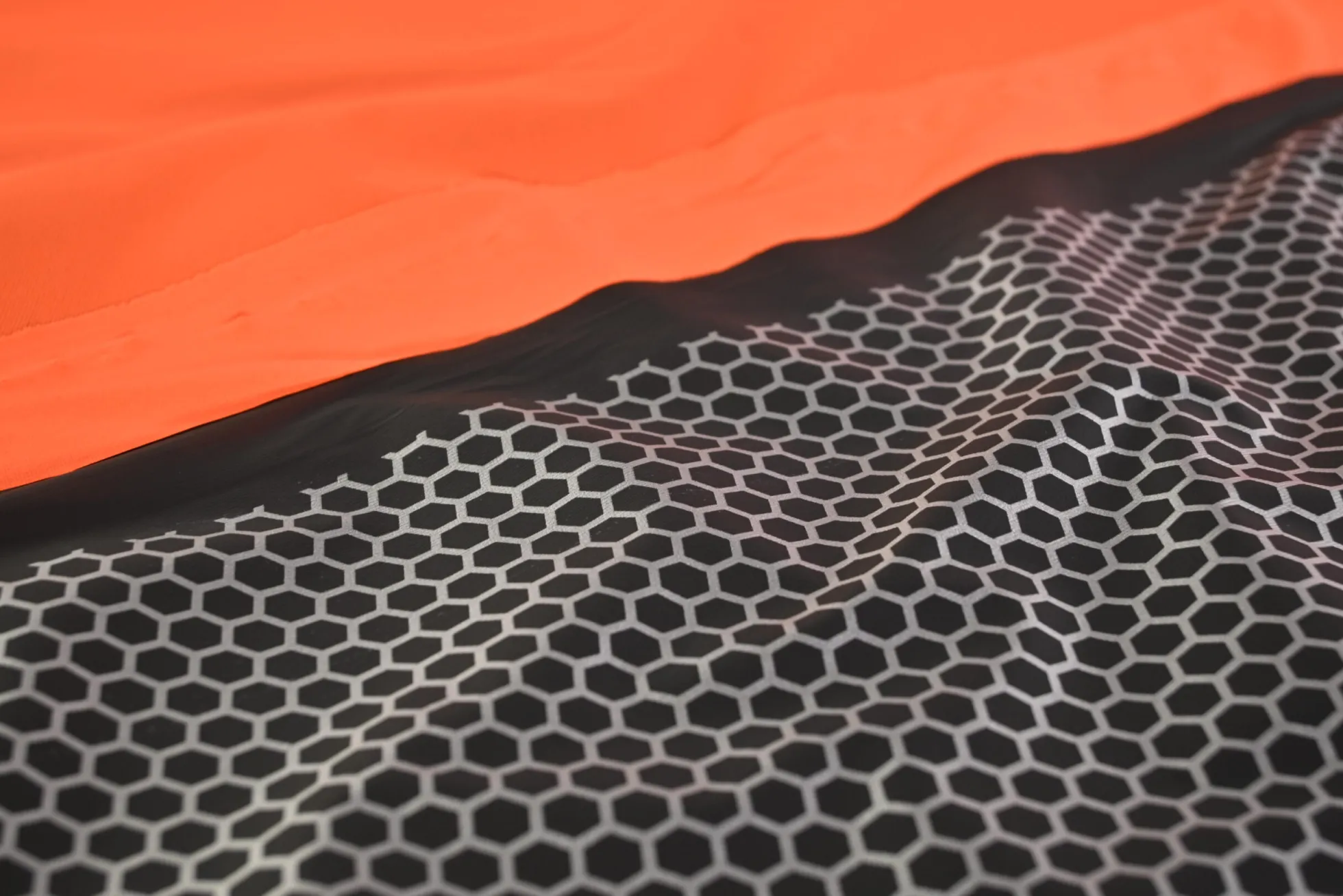 Waterafstotende sport- & outdoorstof – Fluor oranje