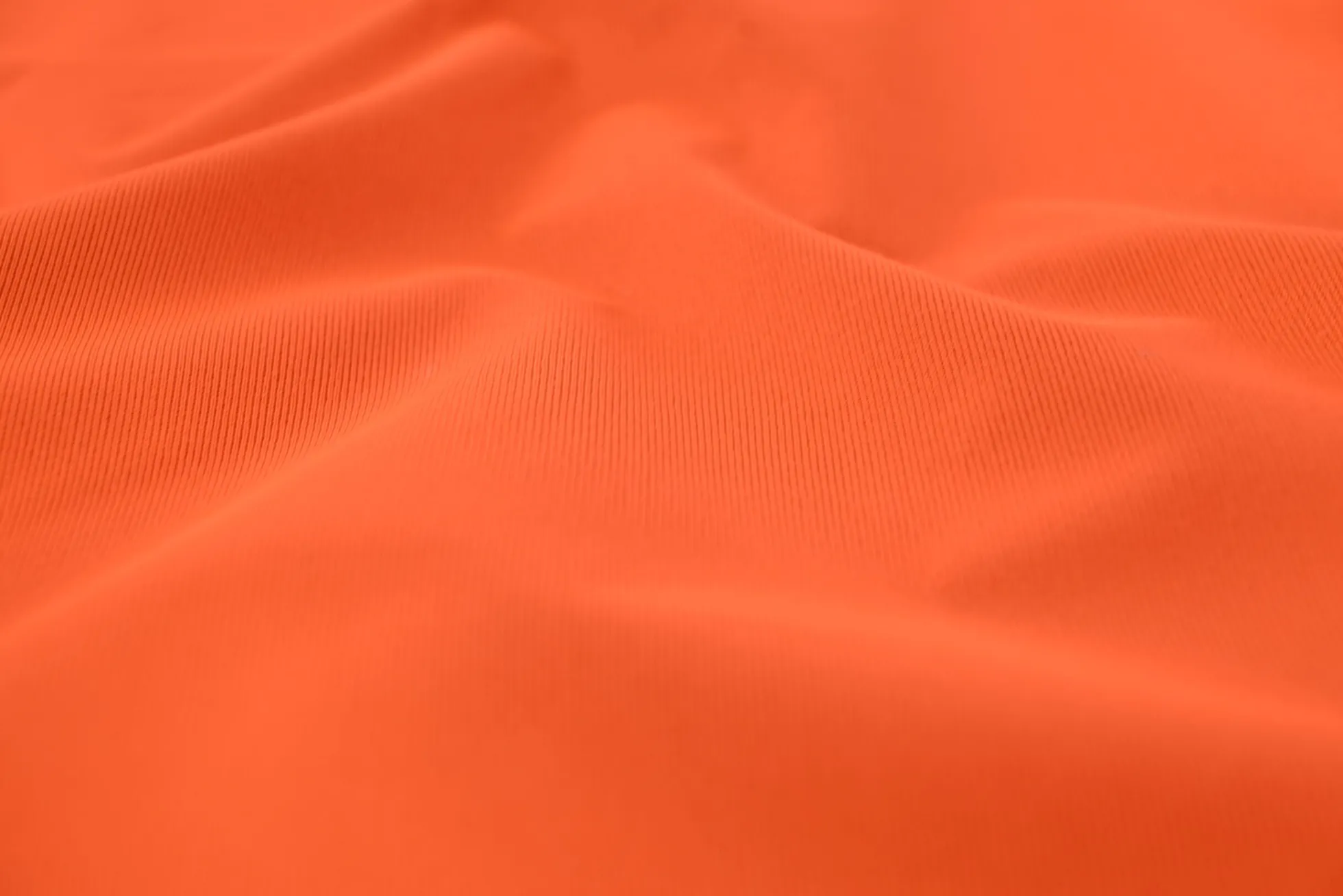 Waterafstotende sport- & outdoorstof – Fluor oranje