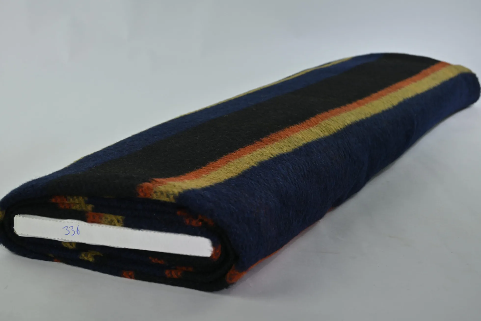 Wollen stof – Navy, zwart, oker & koper ruit